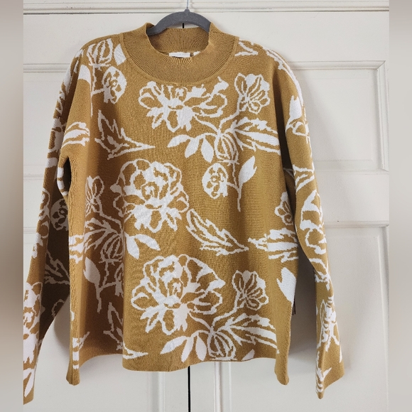 NWT.This is a gold and white floral pullover sweater by the brand Cyrus. - Picture 3 of 7